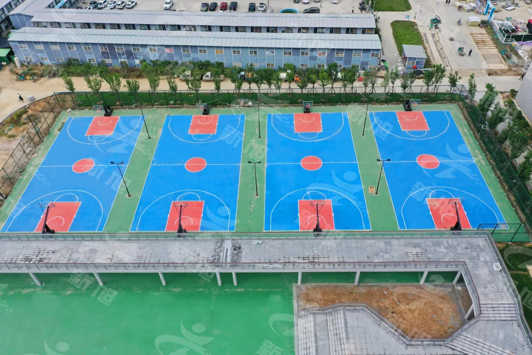 新旭体育驻马店硅pu篮球场完工