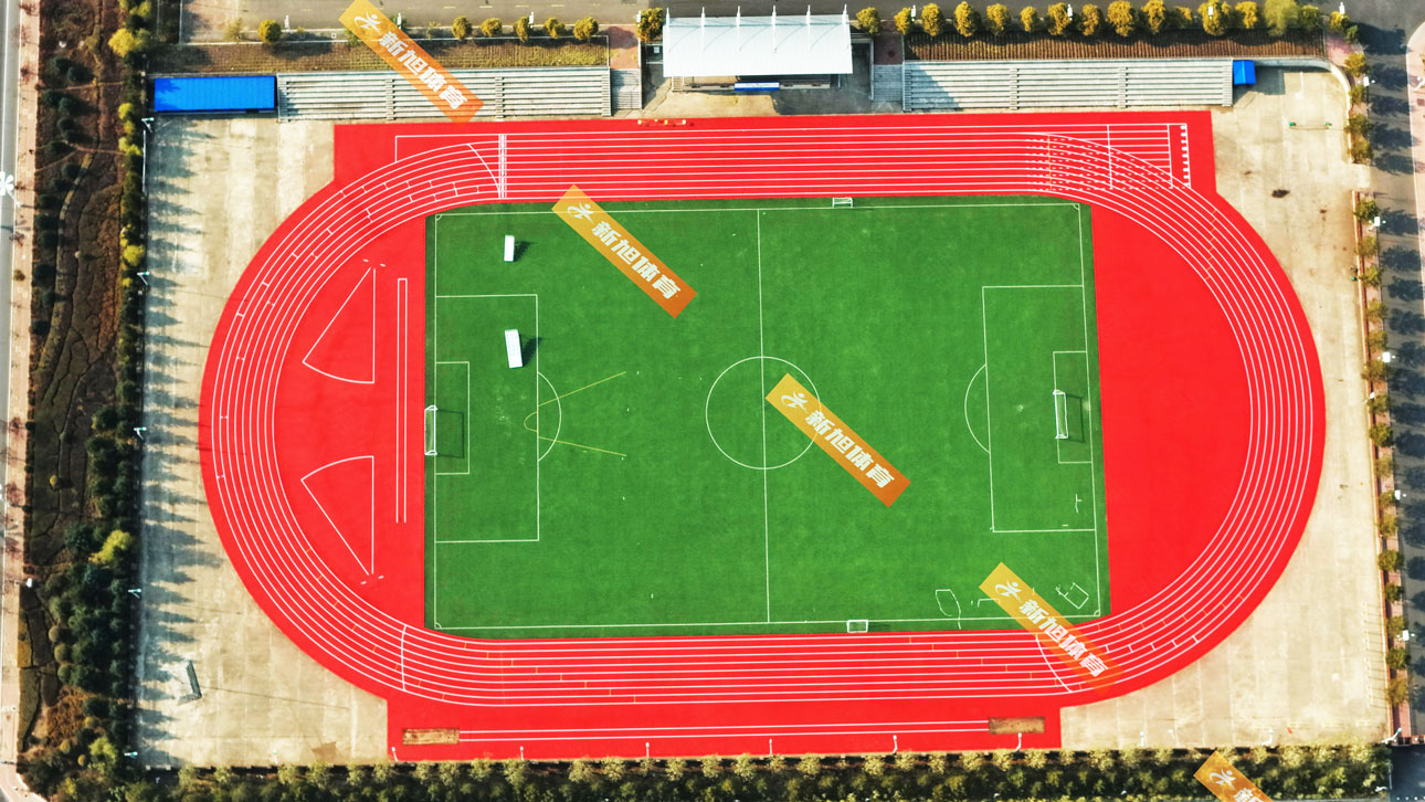 新旭体育哈尔滨混合型自结纹塑胶跑道完工